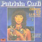 L'homme Sur La Plage (C'était En Décembre) / Je N'aurais Jamais Du