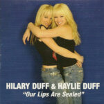 7179e9cb65d39005f28ea55cffc9acb4eeb30c09_0_0.jpeg Our Lips Are Sealed